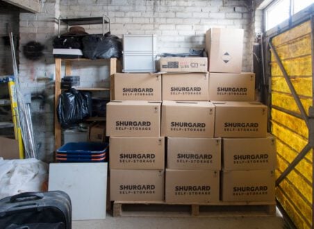 Stacked inventory boxes in a warehouse storage area